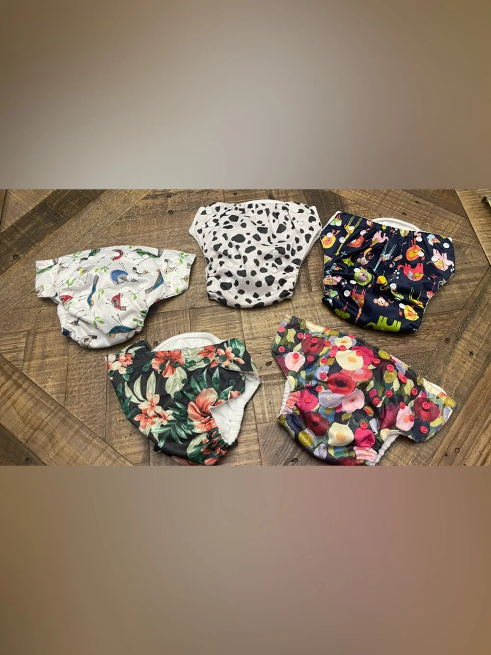 Sunbaby reusable cloth baby diapers with adjustable snaps to grow with baby